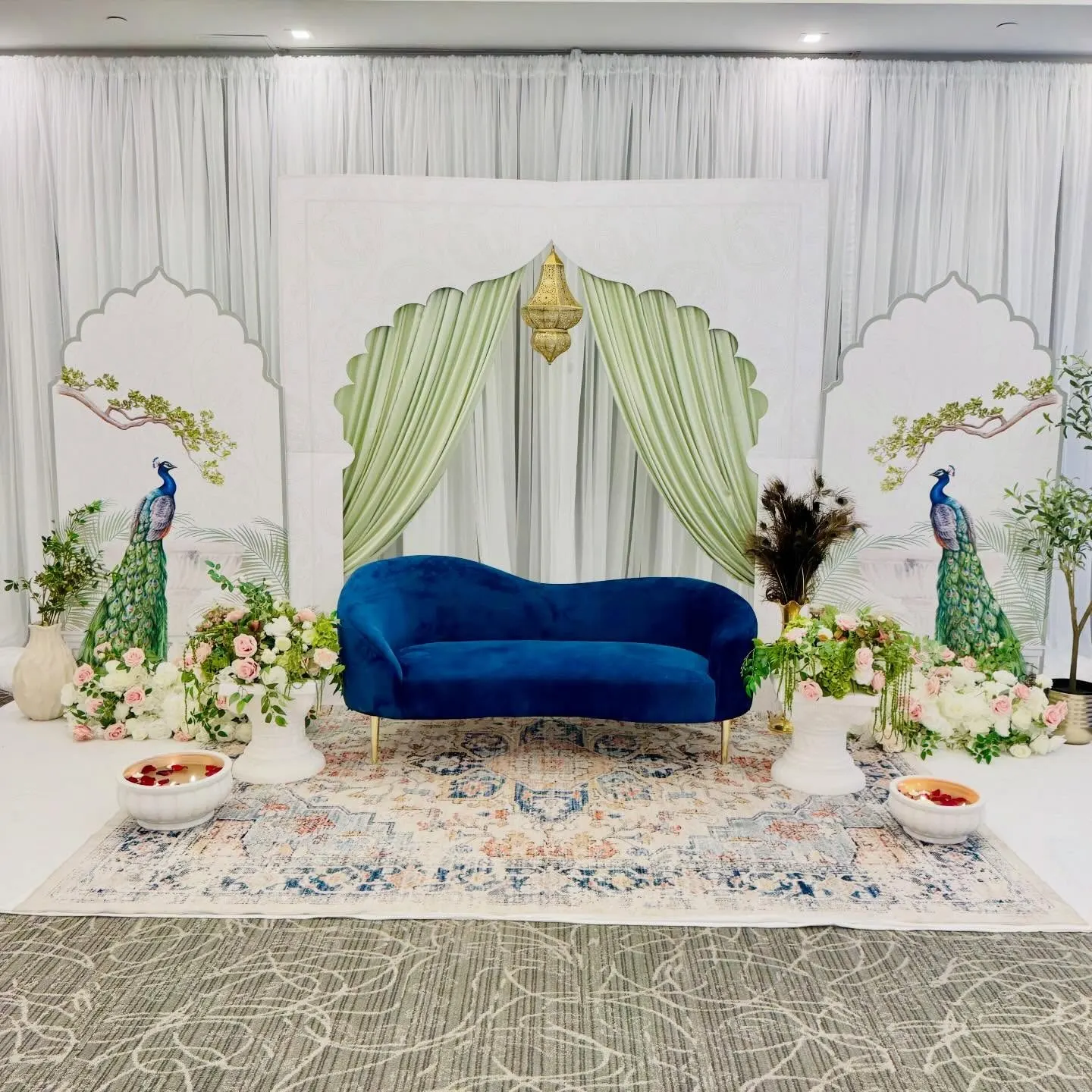 Floral wall graphic behind head table
